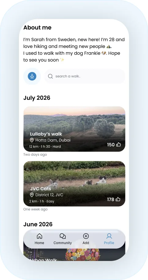 A phone showing the walks list grouped by month with a search field